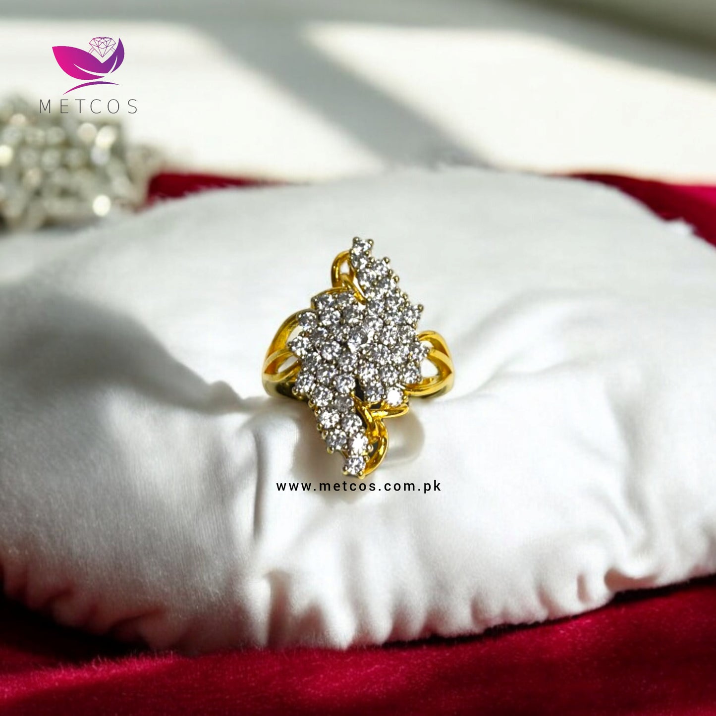 Side profile of the Diamond Supreme gold plated ring showing the band and stone setting