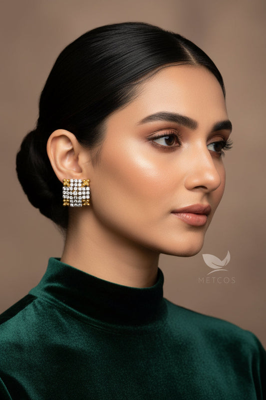 Gold plated diamond-cut square stud earrings set with white zircon stones