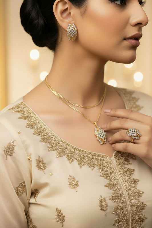 Royal Diamond pendant set in 24K gold plating with American zircon, held in hand to show scale