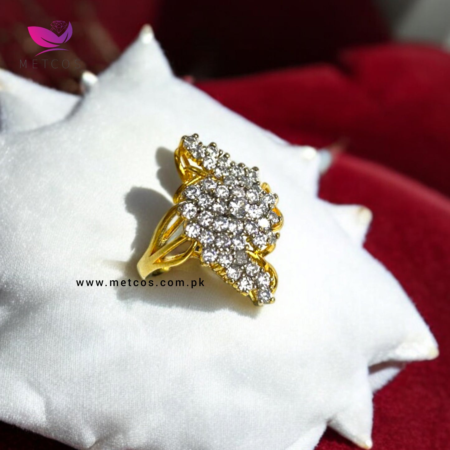 Diamond Supreme 24K gold plated ring with a raised solitaire-style American zircon