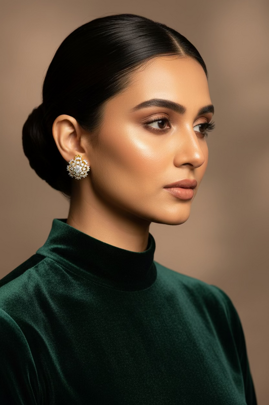 Elina 24K gold plated stud earrings with a small round American zircon in a gold setting