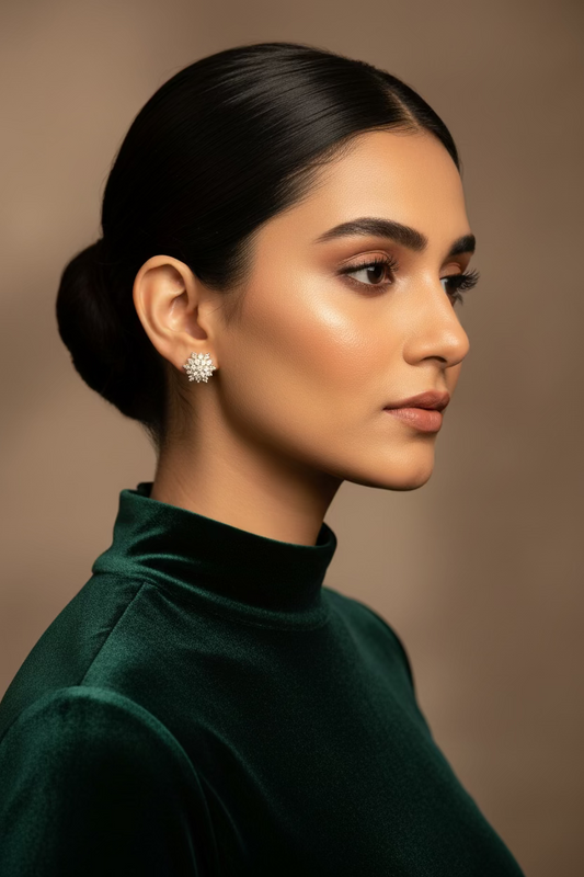Livia 24K gold plated snowflake shaped stud earrings set with clear zircon stones