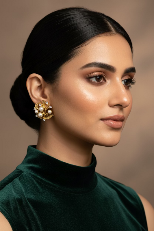 Aqua Pearl 24K gold plated stud earrings with a pearl centre and pale aqua zircon accents