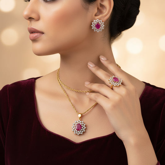 Ruby Royale locket set in 24K gold plating with ruby-red stones and American zircon, with chain and matching earrings
