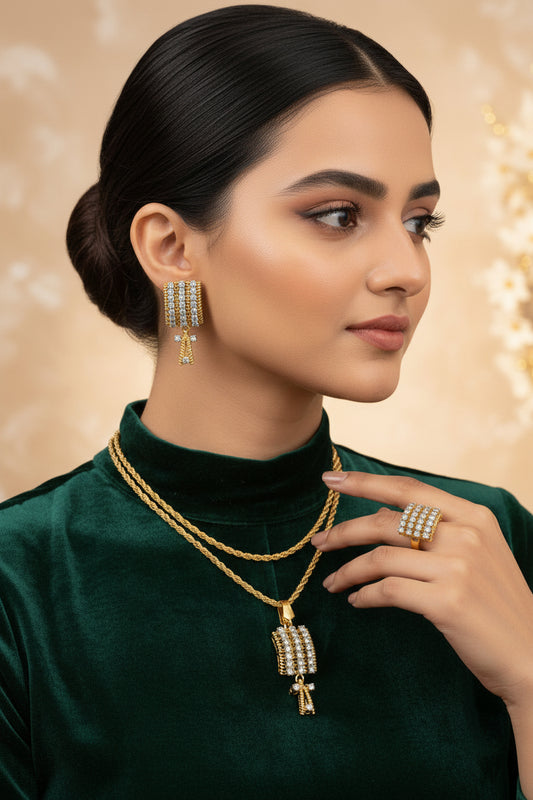 Gold jewelry set with necklace, ring, and earrings on a beige background with 'Metcos' branding.