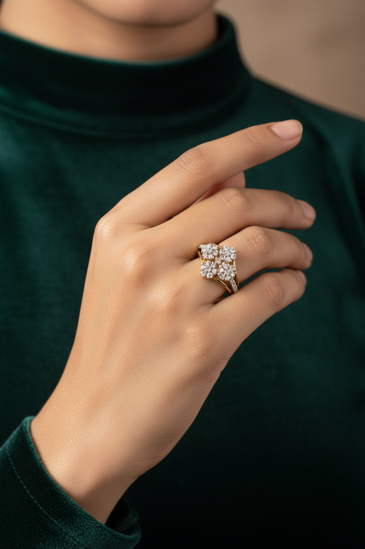 A 24K gold plated diamond ring with a twilight sparkle design, featuring a central diamond surrounded by smaller ones, all set in a yellow gold band.