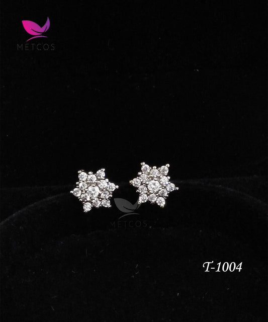 Star-shaped diamond-cut 24K gold plated stud earrings with a central American zircon