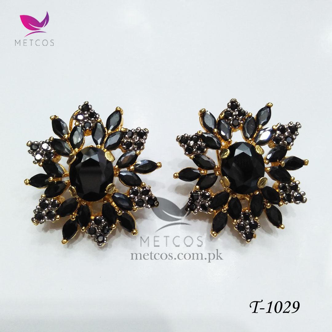 Oval jurao 24K gold plated studs set with black stones surrounded by American zircon
