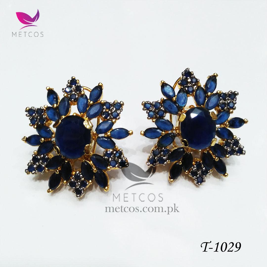 Oval jurao 24K gold plated studs set with blue stones surrounded by American zircon