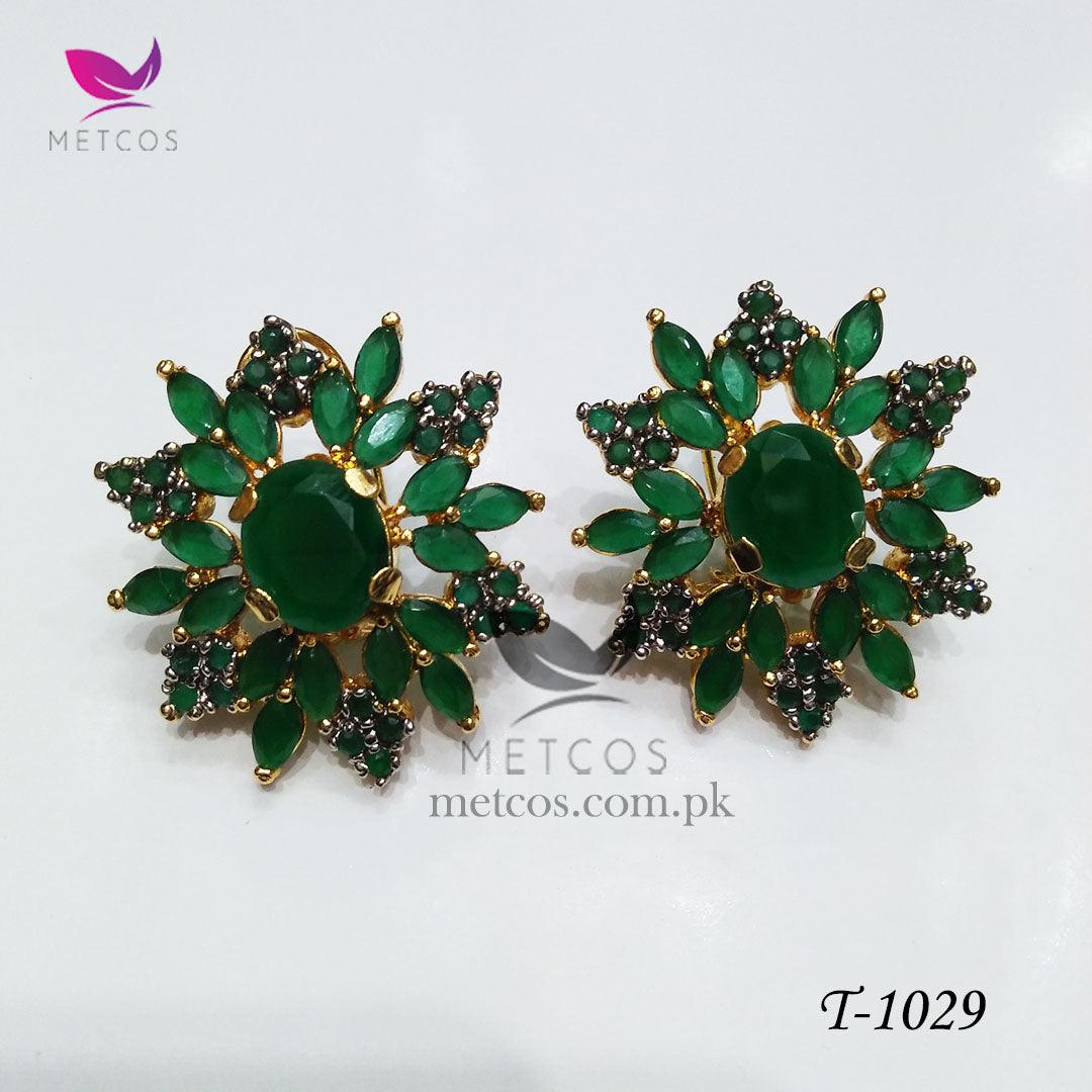 Oval jurao 24K gold plated studs set with emerald green stones surrounded by American zircon