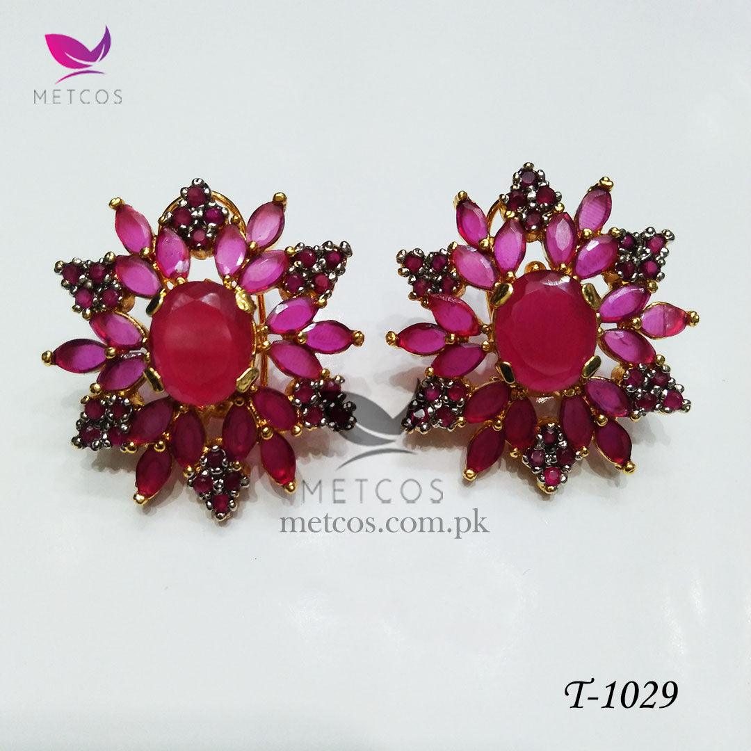 Oval jurao 24K gold plated studs set with ruby red stones surrounded by American zircon