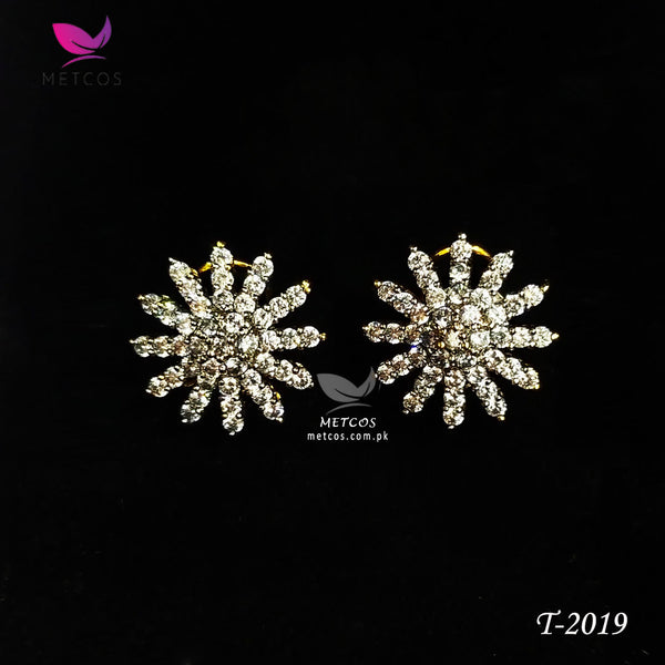 Diamond cut earrings, sparkling diamond studs, luxury jewelry