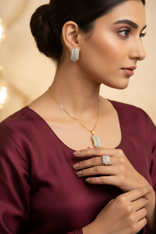 Penta Shield diamond locket set in 24K gold plating, displayed with Metcos gift boxes